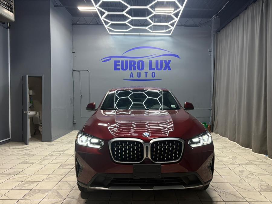 used 2022 BMW X4 car, priced at $34,995