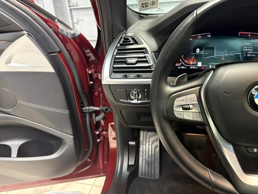 used 2022 BMW X4 car, priced at $34,995