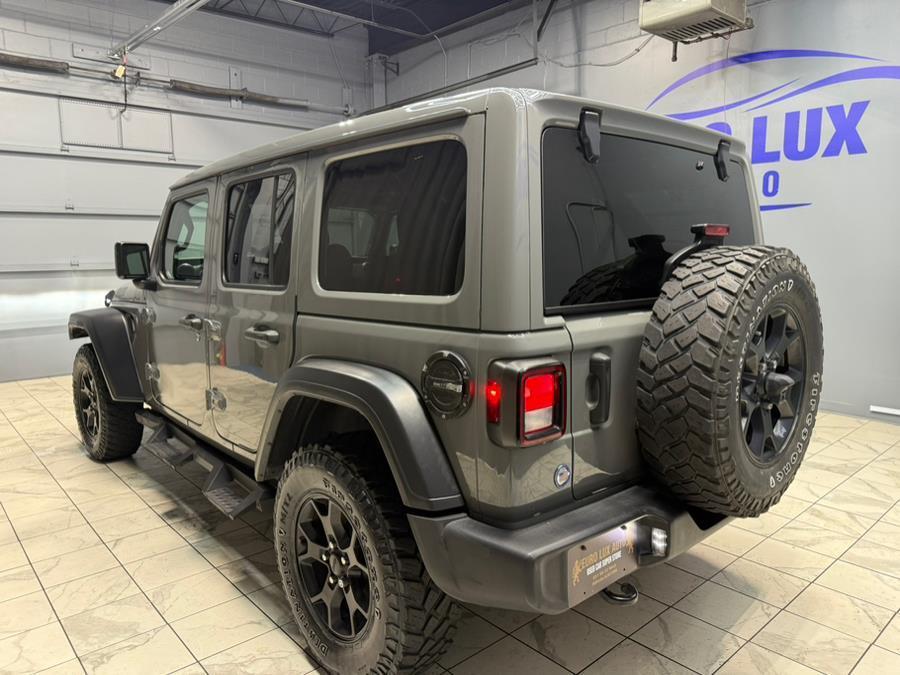 used 2021 Jeep Wrangler Unlimited car, priced at $26,495