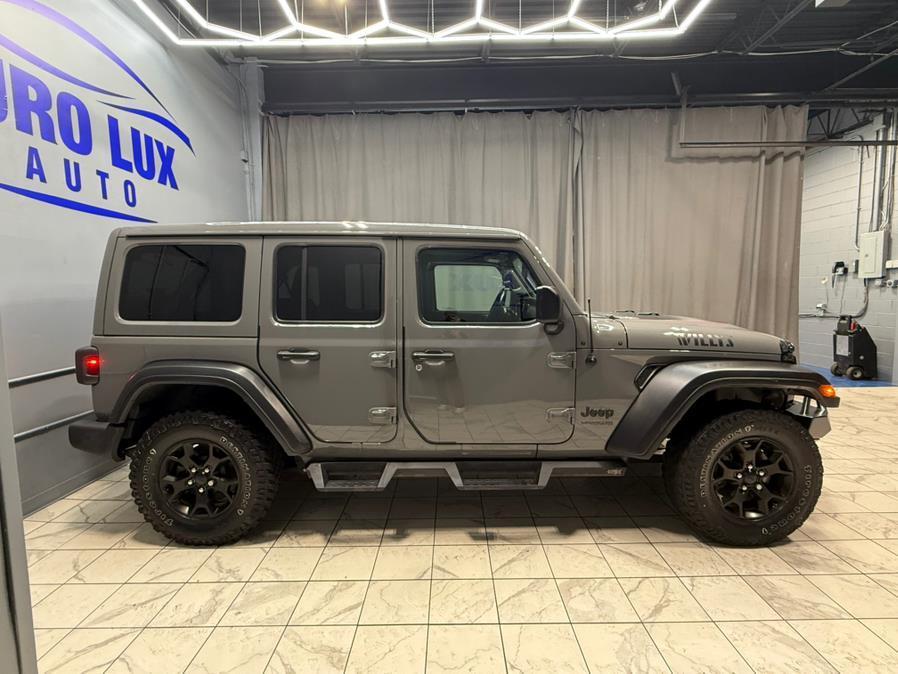used 2021 Jeep Wrangler Unlimited car, priced at $26,495