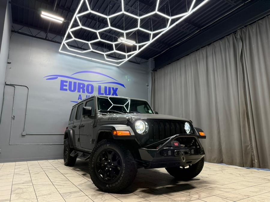used 2021 Jeep Wrangler Unlimited car, priced at $26,495