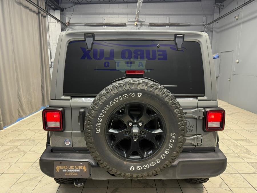 used 2021 Jeep Wrangler Unlimited car, priced at $26,495