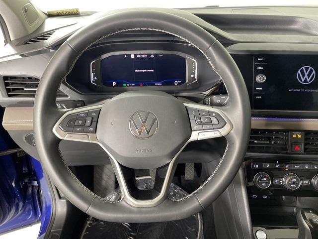 used 2022 Volkswagen Taos car, priced at $24,000