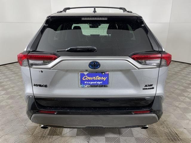 used 2021 Toyota RAV4 Hybrid car, priced at $32,000