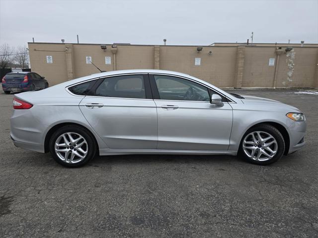 used 2013 Ford Fusion car, priced at $4,689