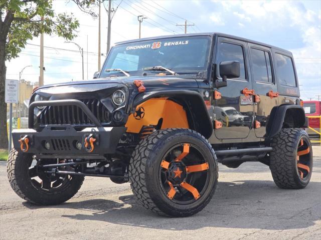 used 2015 Jeep Wrangler Unlimited car, priced at $17,978