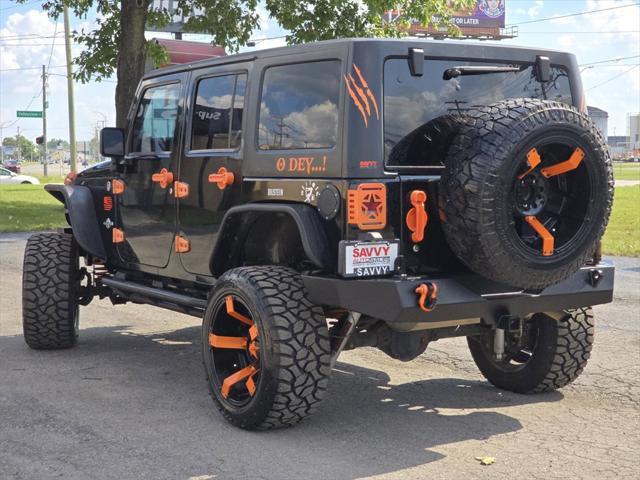 used 2015 Jeep Wrangler Unlimited car, priced at $17,978