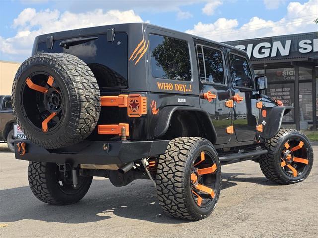 used 2015 Jeep Wrangler Unlimited car, priced at $17,978