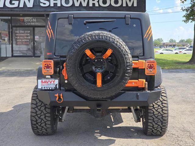 used 2015 Jeep Wrangler Unlimited car, priced at $17,978