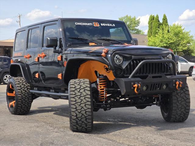 used 2015 Jeep Wrangler Unlimited car, priced at $17,978