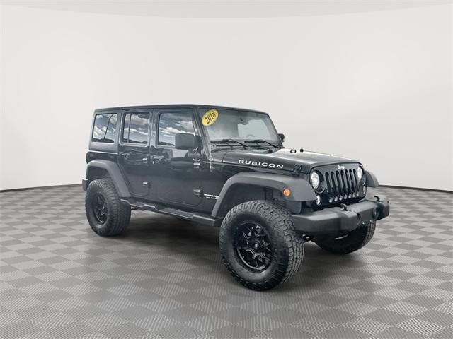 used 2018 Jeep Wrangler JK Unlimited car, priced at $27,499