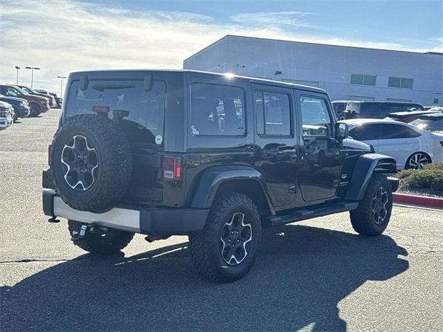 used 2014 Jeep Wrangler Unlimited car, priced at $17,896