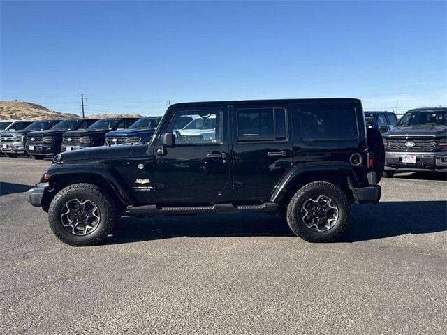 used 2014 Jeep Wrangler Unlimited car, priced at $17,896