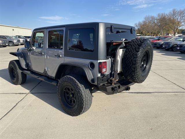 used 2013 Jeep Wrangler Unlimited car, priced at $18,990