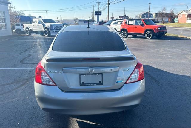 used 2013 Nissan Versa car, priced at $4,999