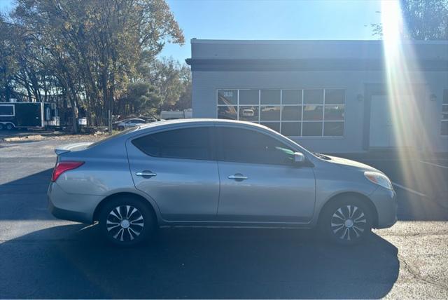 used 2013 Nissan Versa car, priced at $4,999