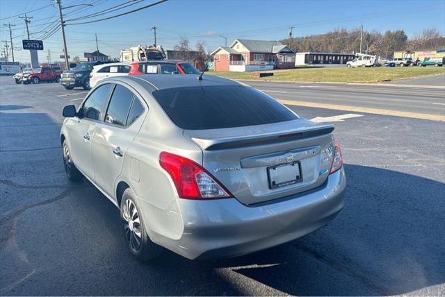 used 2013 Nissan Versa car, priced at $4,999