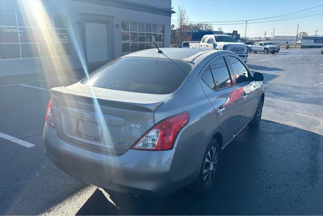 used 2013 Nissan Versa car, priced at $4,999