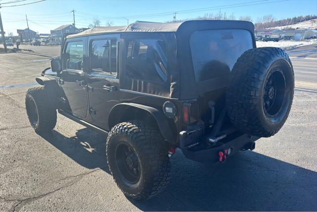 used 2015 Jeep Wrangler Unlimited car, priced at $19,400