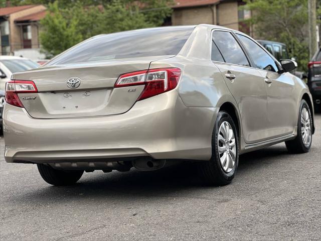 used 2014 Toyota Camry car, priced at $9,997