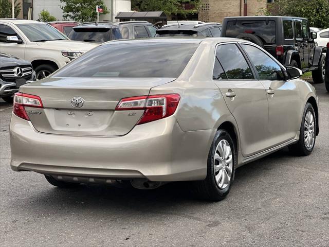 used 2014 Toyota Camry car, priced at $9,997