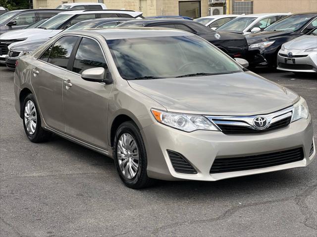 used 2014 Toyota Camry car, priced at $9,997