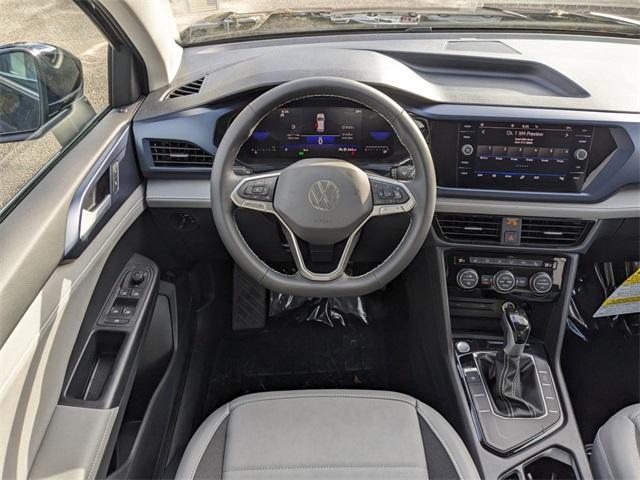 new 2024 Volkswagen Taos car, priced at $27,706