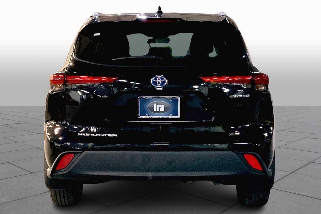 used 2022 Toyota Highlander Hybrid car, priced at $37,288