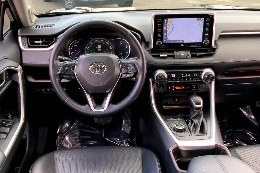 used 2021 Toyota RAV4 Hybrid car, priced at $33,488