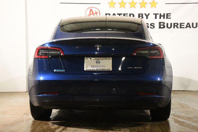 used 2022 Tesla Model 3 car, priced at $27,495