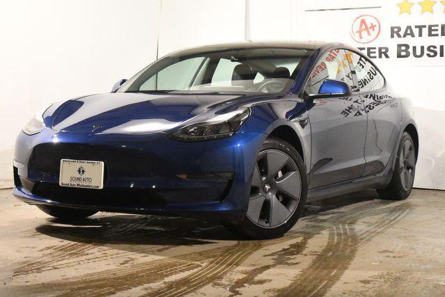 used 2022 Tesla Model 3 car, priced at $27,495
