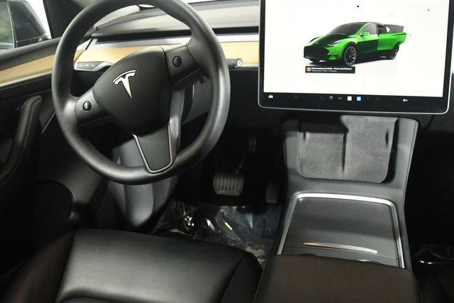 used 2023 Tesla Model Y car, priced at $30,995