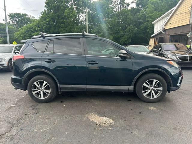 used 2017 Toyota RAV4 car, priced at $11,999