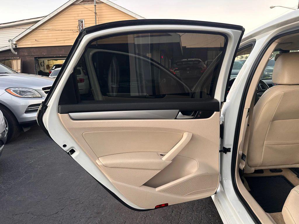 used 2014 Volkswagen Passat car, priced at $4,999