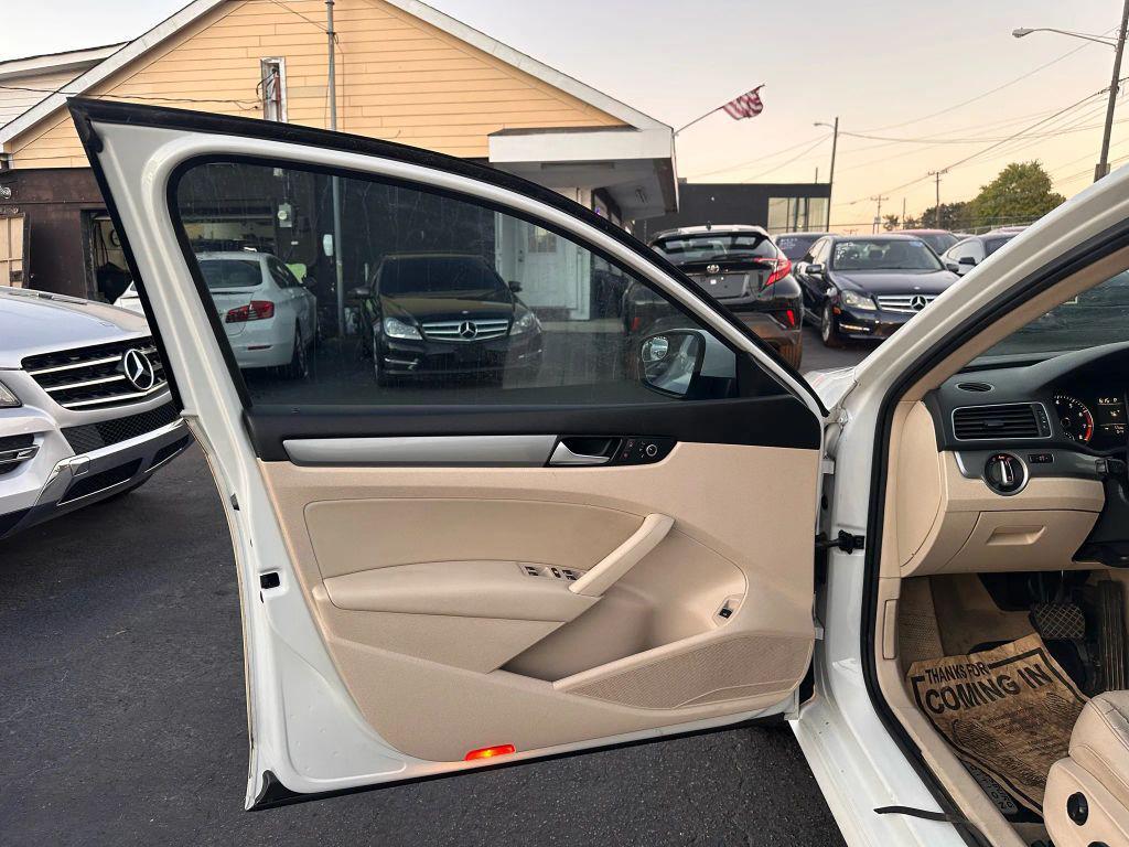 used 2014 Volkswagen Passat car, priced at $4,999