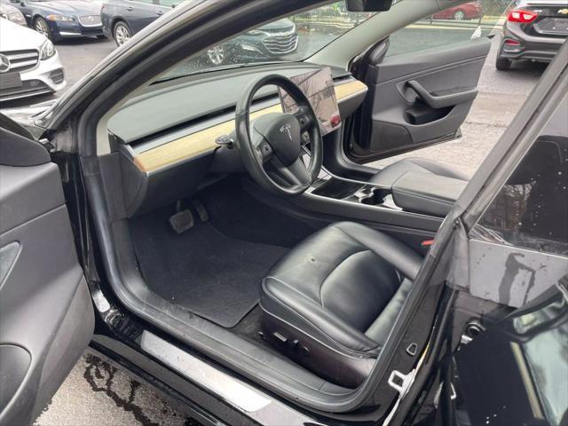 used 2018 Tesla Model 3 car, priced at $19,499