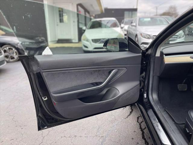 used 2018 Tesla Model 3 car, priced at $19,499