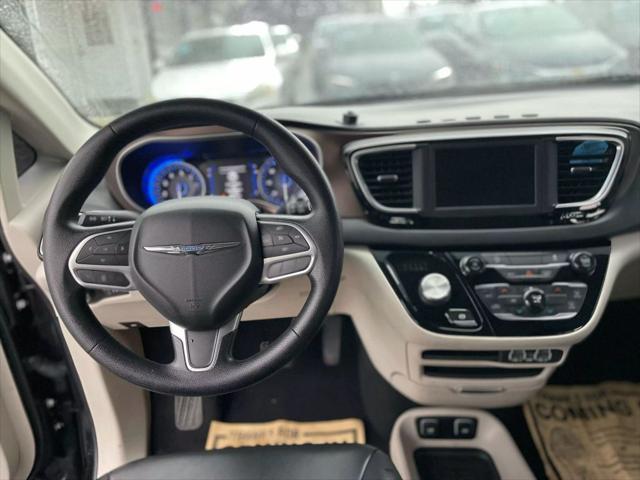 used 2021 Chrysler Voyager car, priced at $10,999