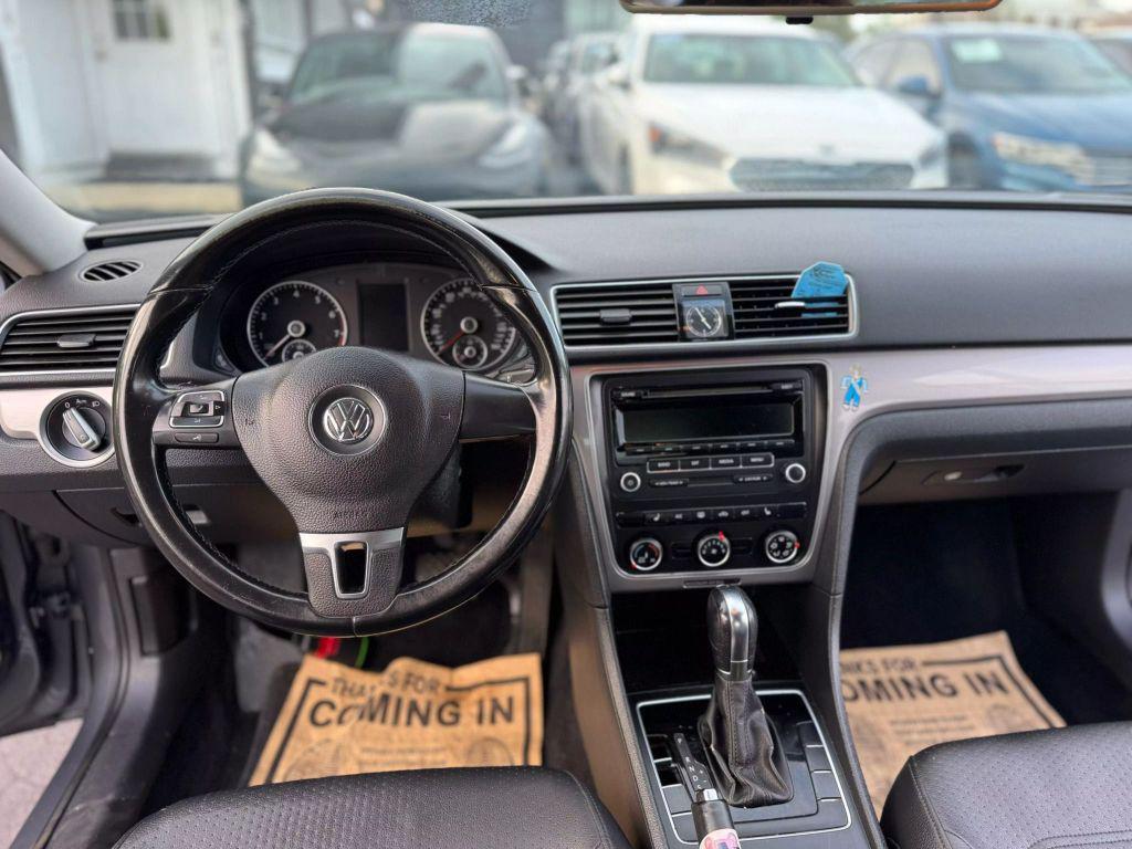 used 2014 Volkswagen Passat car, priced at $5,499