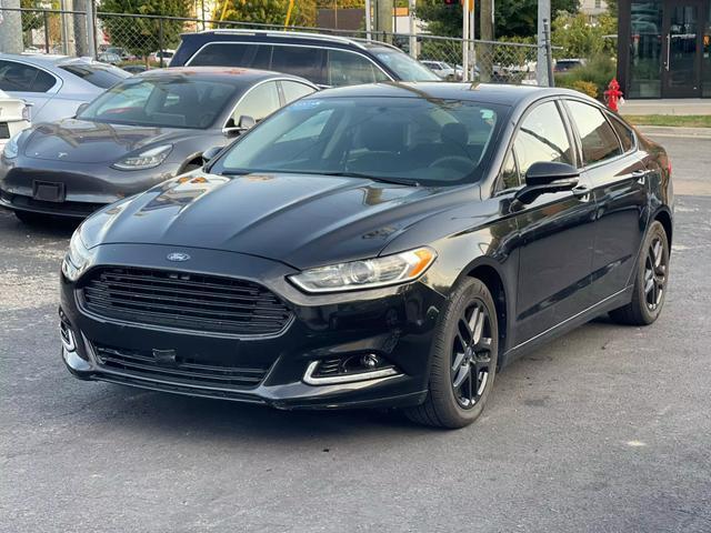 used 2013 Ford Fusion car, priced at $6,499