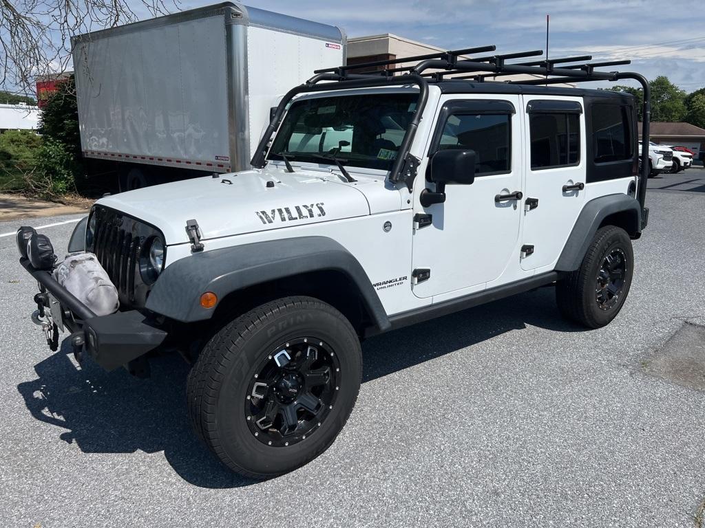 used 2016 Jeep Wrangler Unlimited car, priced at $18,940