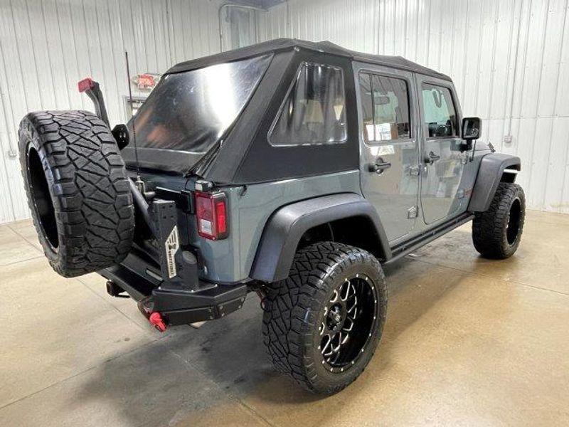 used 2014 Jeep Wrangler Unlimited car, priced at $16,891