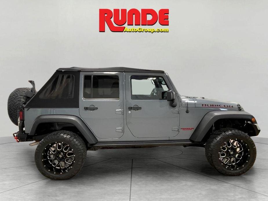 used 2014 Jeep Wrangler Unlimited car, priced at $15,992