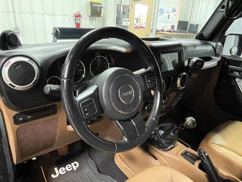 used 2014 Jeep Wrangler Unlimited car, priced at $16,891