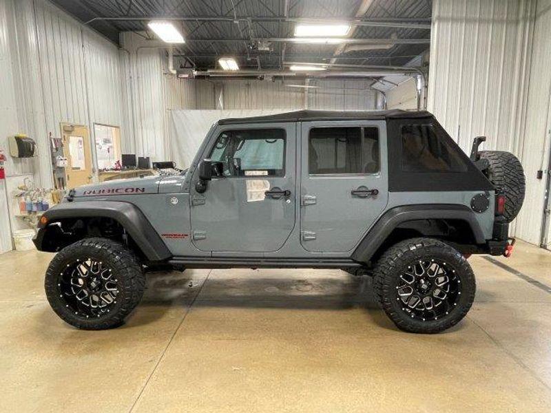 used 2014 Jeep Wrangler Unlimited car, priced at $16,891