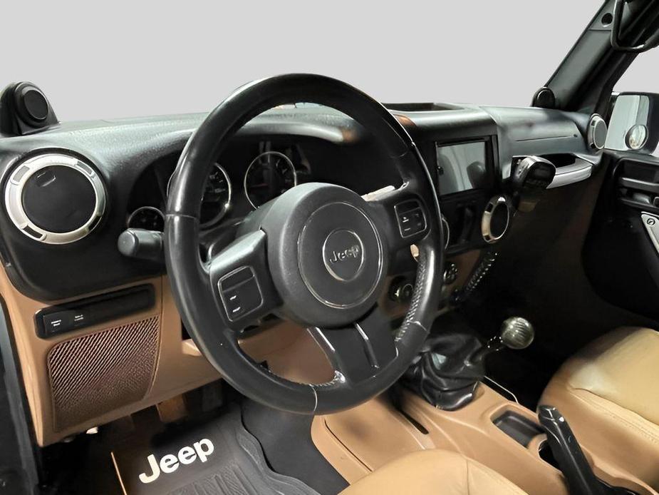 used 2014 Jeep Wrangler Unlimited car, priced at $15,992