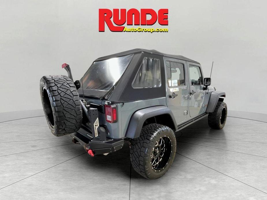 used 2014 Jeep Wrangler Unlimited car, priced at $15,992