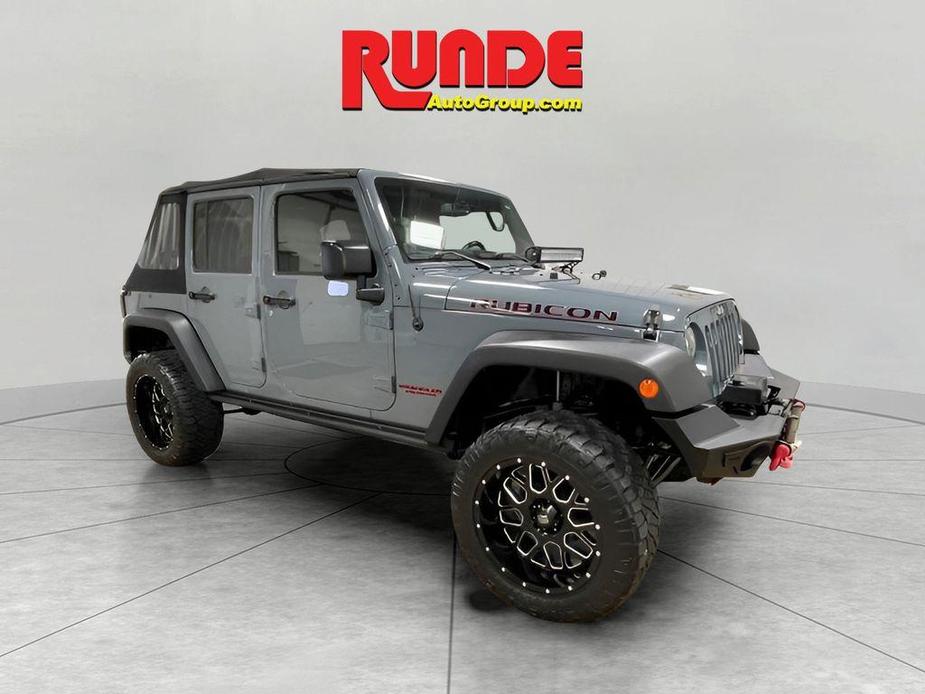 used 2014 Jeep Wrangler Unlimited car, priced at $15,992