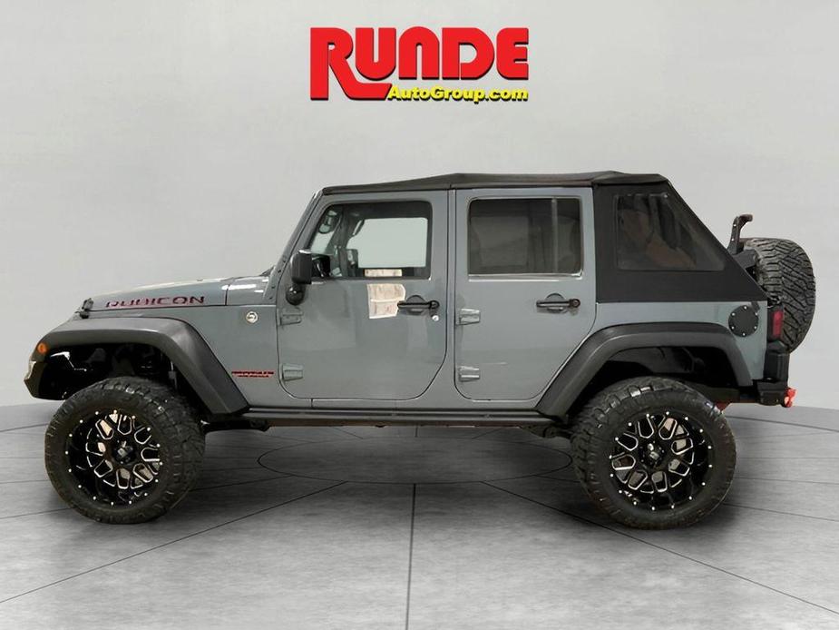 used 2014 Jeep Wrangler Unlimited car, priced at $15,992