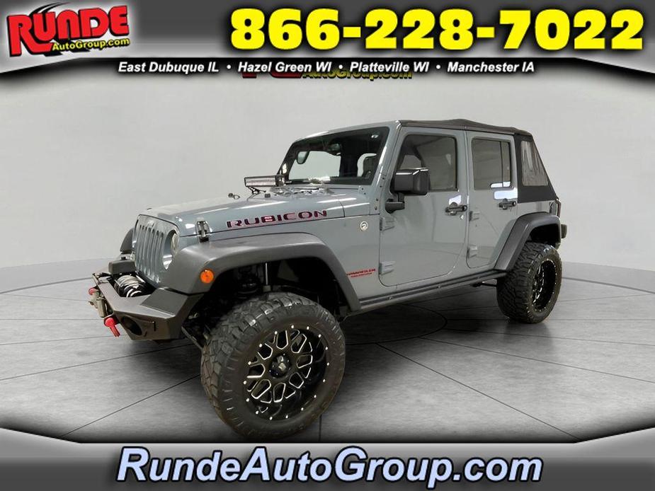 used 2014 Jeep Wrangler Unlimited car, priced at $15,992